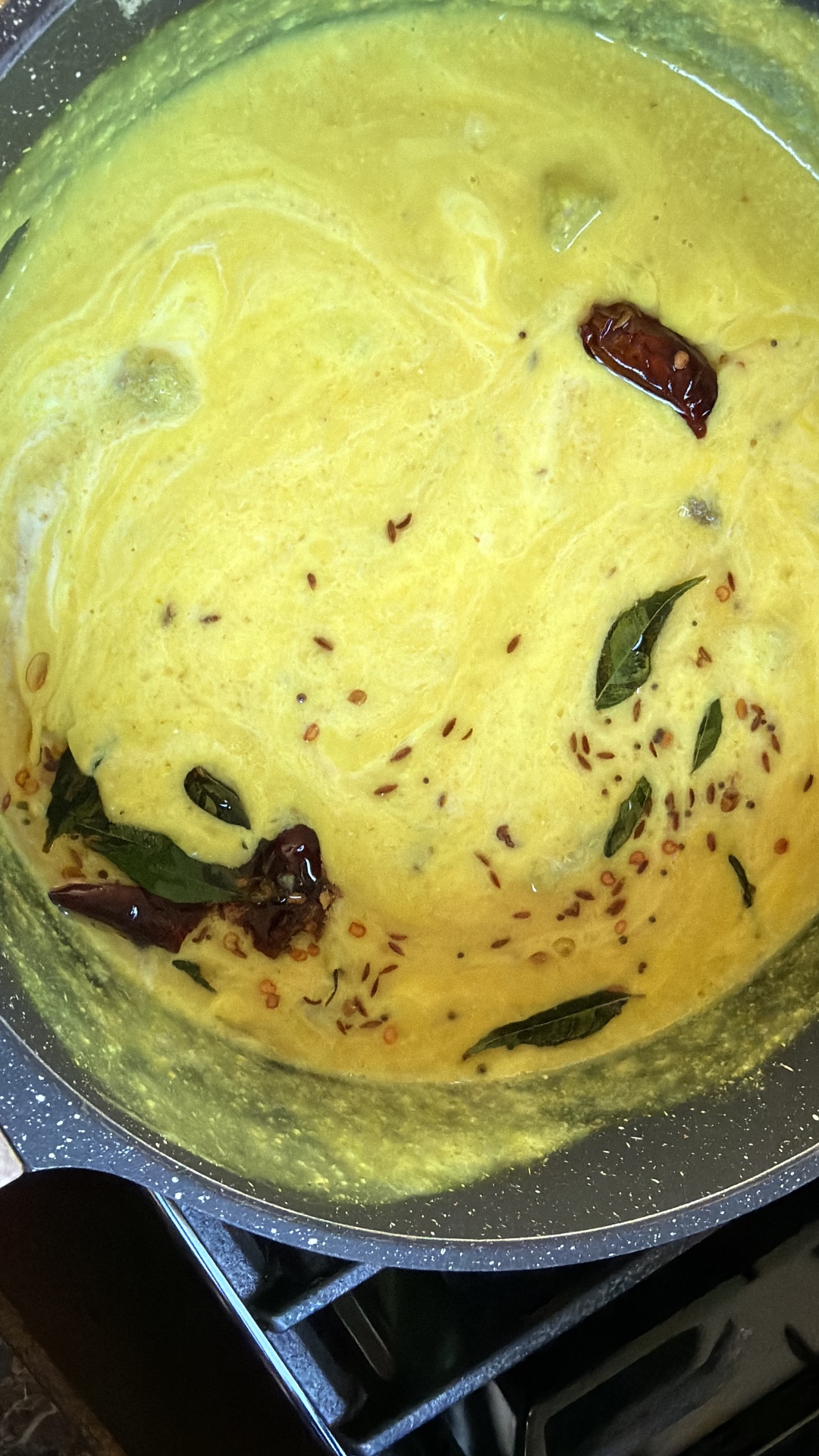 Yellow dal tempered with curry leaves and chilies
